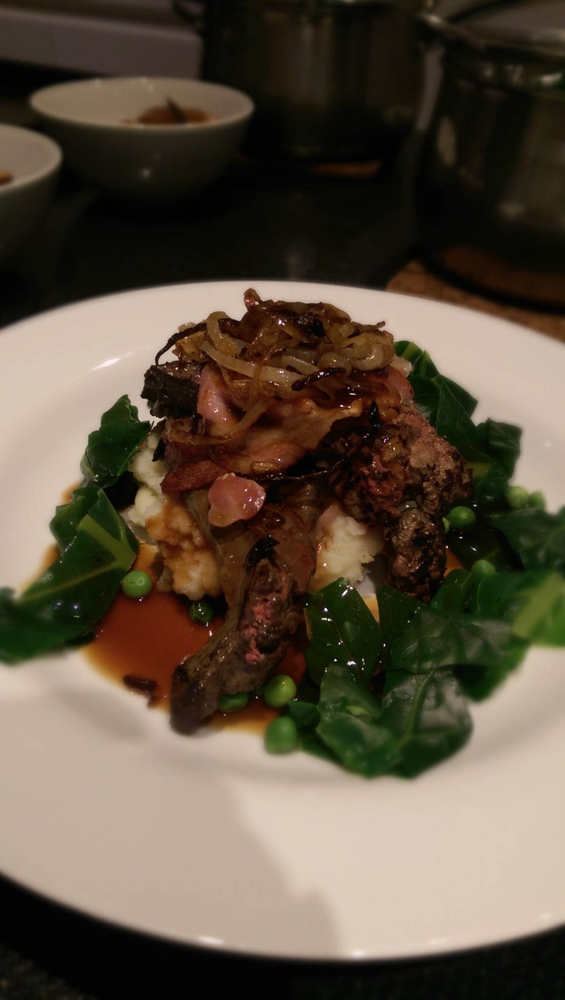 Liver, bacon and mash with spring greens and gravy